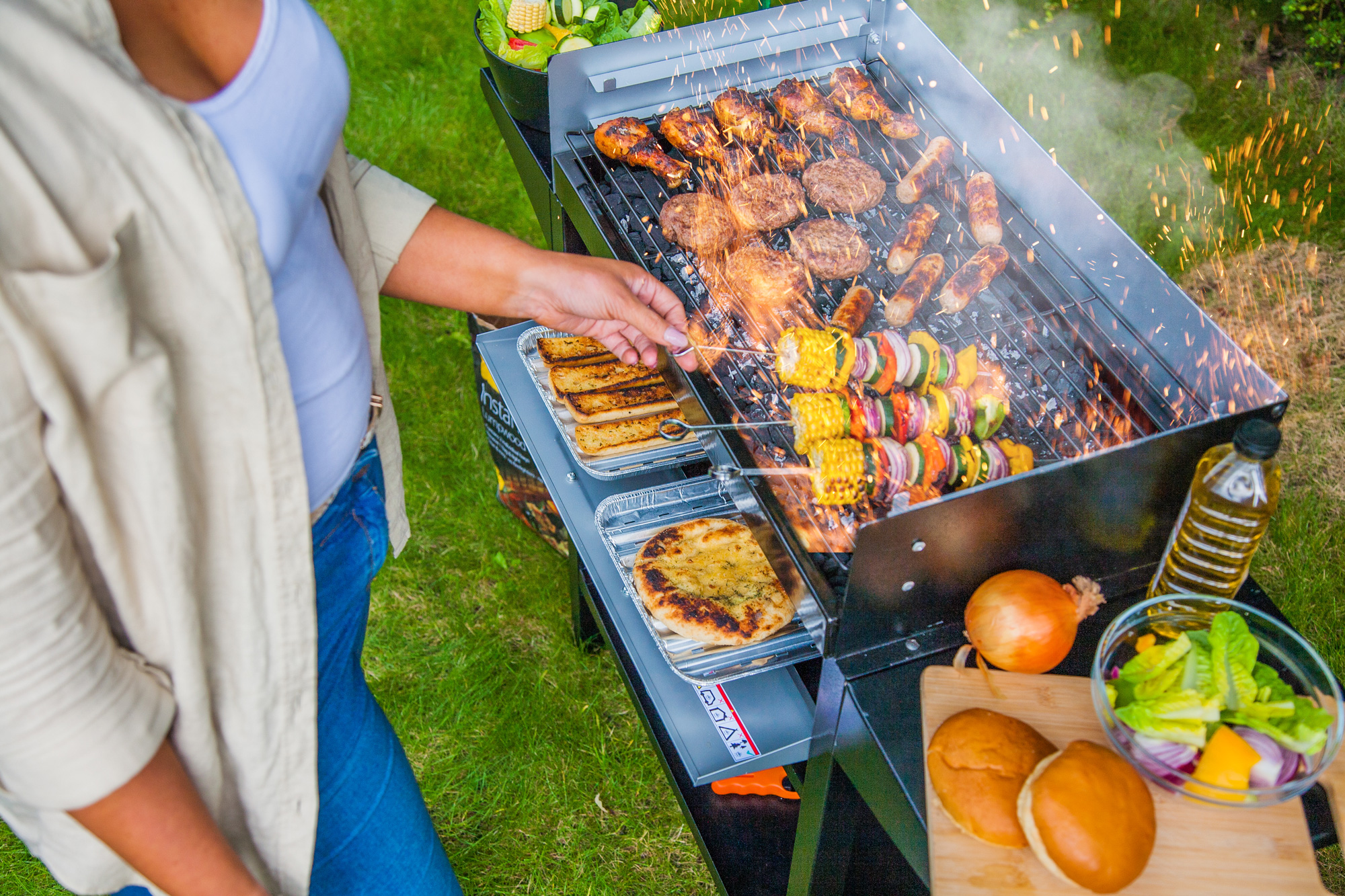 Versatile Barbecue Grill with Heated Oven and Easy Cleaning